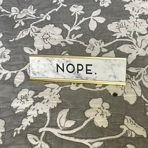 “Nope” marble desk sign